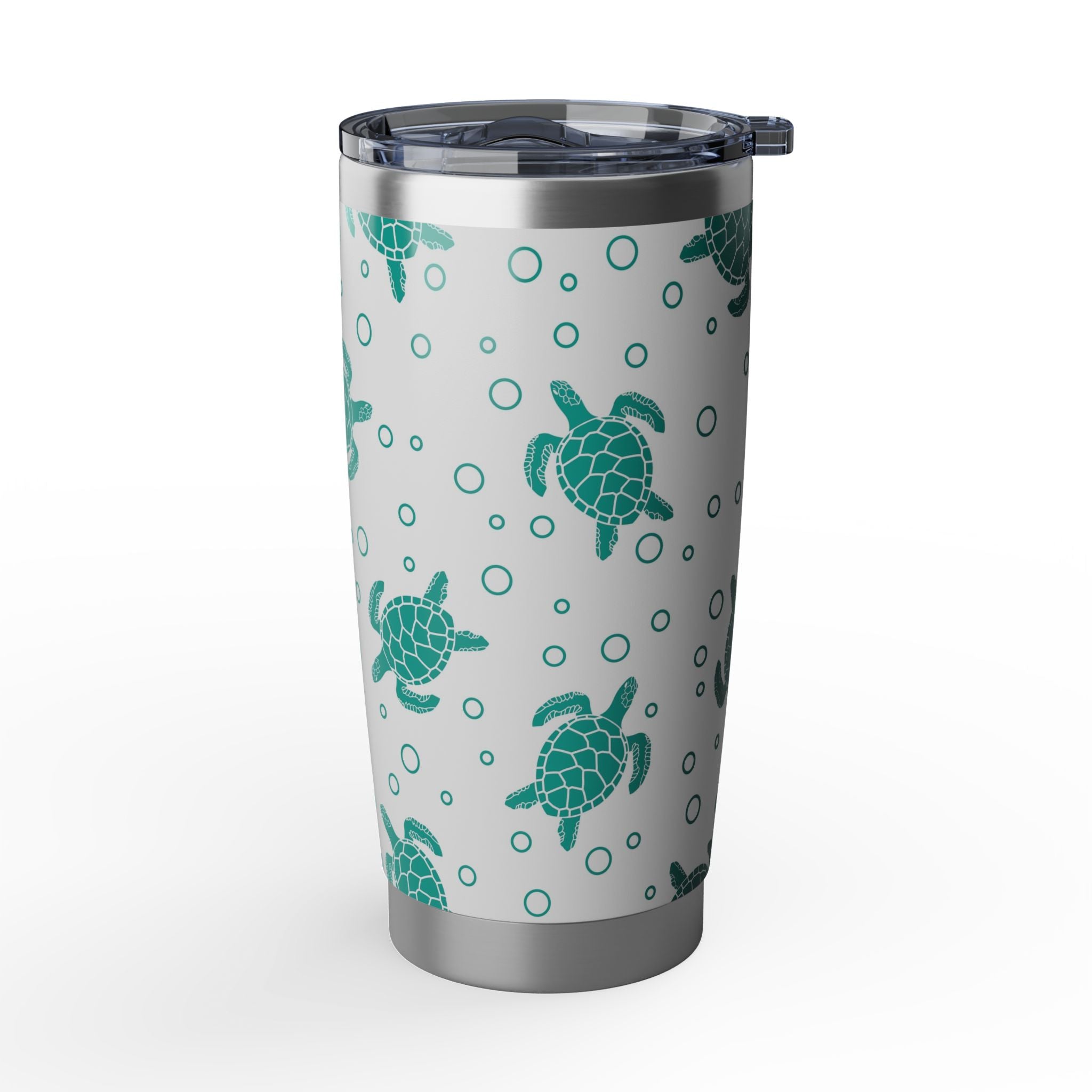 Silver tumbler with green turtle pattern on a white background